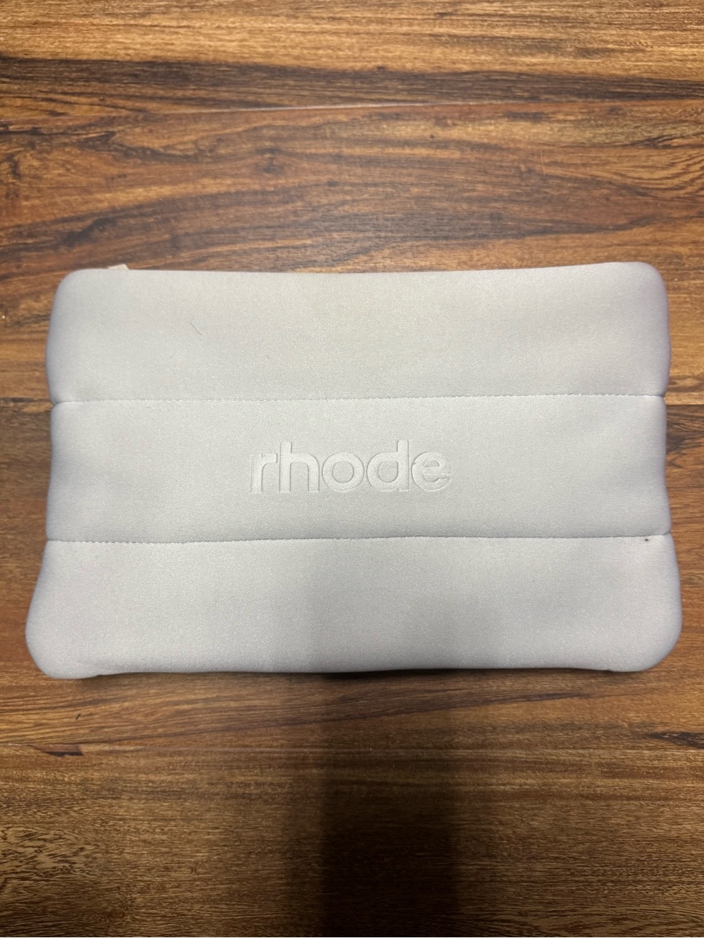 RHODE embossed soft pouch in light gray